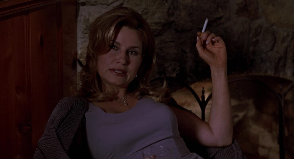 Jennifer Coolidge (Stifler's MOM) smoking a cigarette