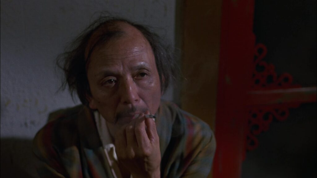 James Hong smokin a cigarette