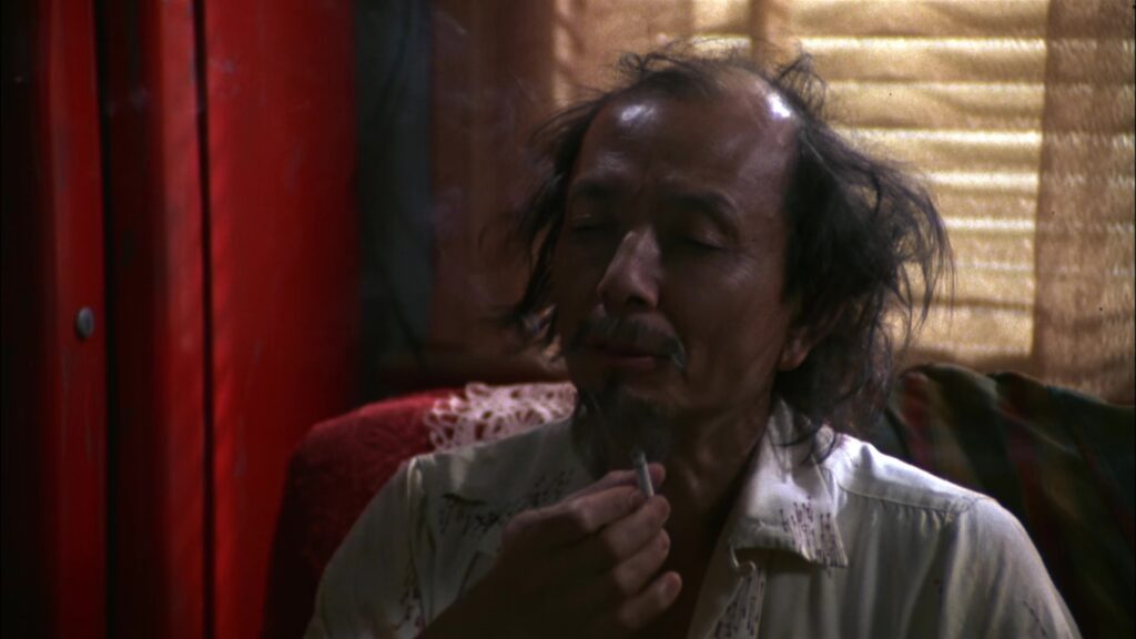 James Hong smokin a cigarette